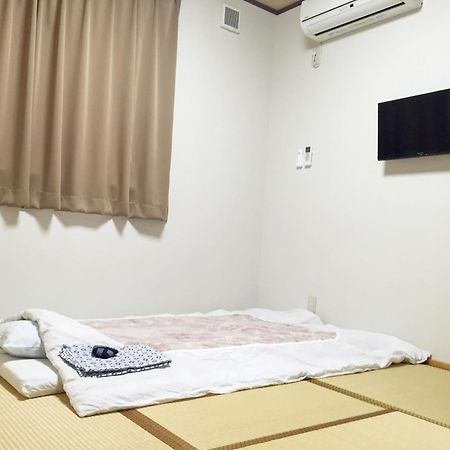 Hotel Onsenminshuku Kosakaya Nachikatsuura Habitación foto