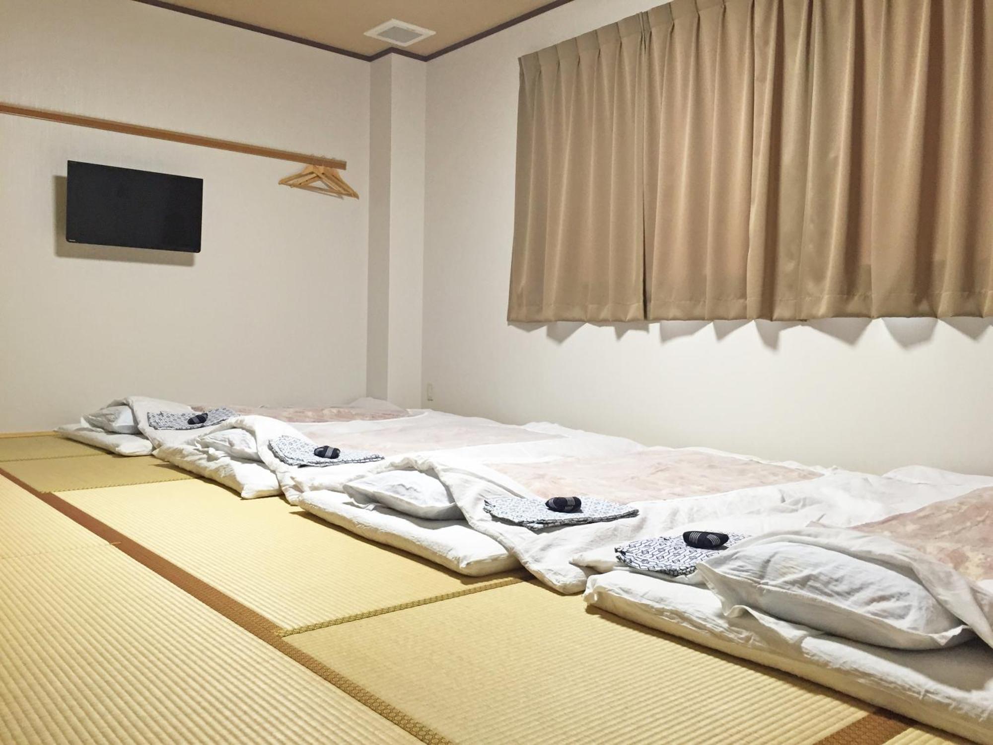 Hotel Onsenminshuku Kosakaya Nachikatsuura Habitación foto