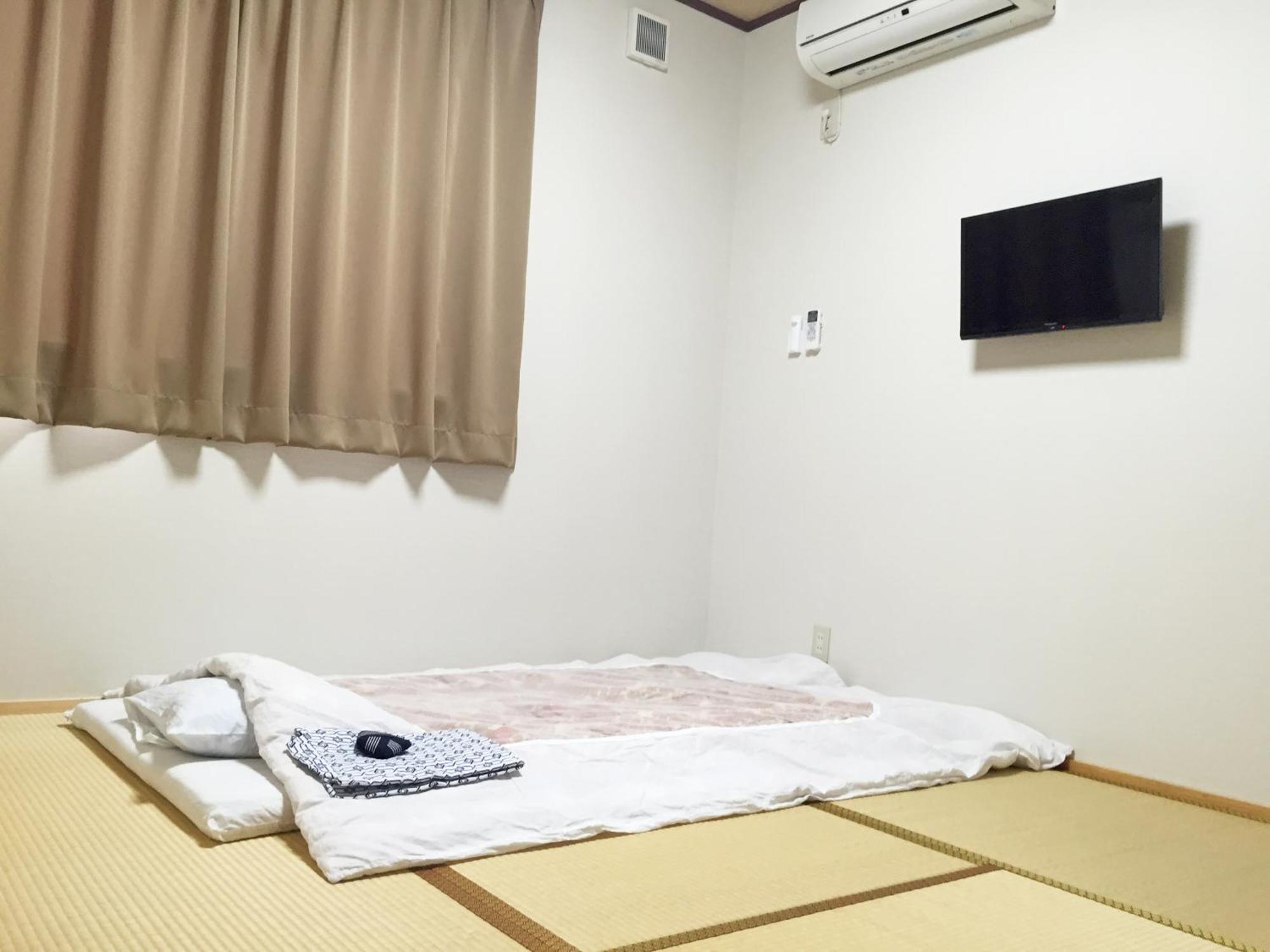 Hotel Onsenminshuku Kosakaya Nachikatsuura Habitación foto